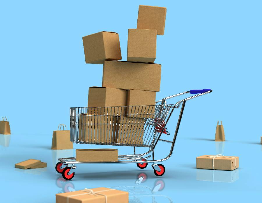 Online shopping on laptop with cart icon - Pexels